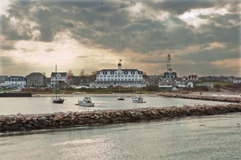 Boats at anchor off Block Island, Rhode Island, with hotels on the shore