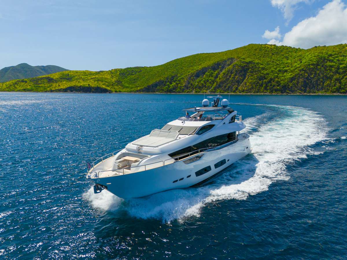 Leeward Islands anchorage with a yacht at anchor