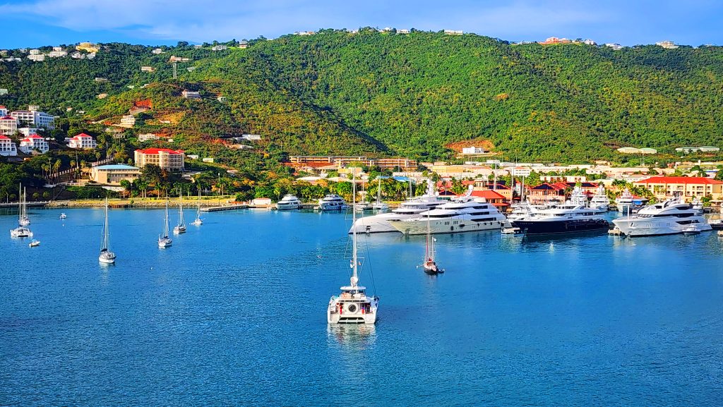 The bay where high priced yachts docked alongside of local sailboats in St. Thomas Virgin Islands Charlotte Amalie