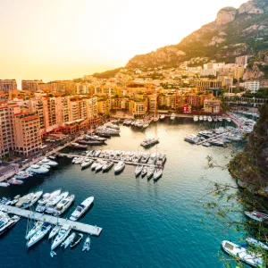 Yachts berthed at Port de Fontvieille, Monaco, in evening light