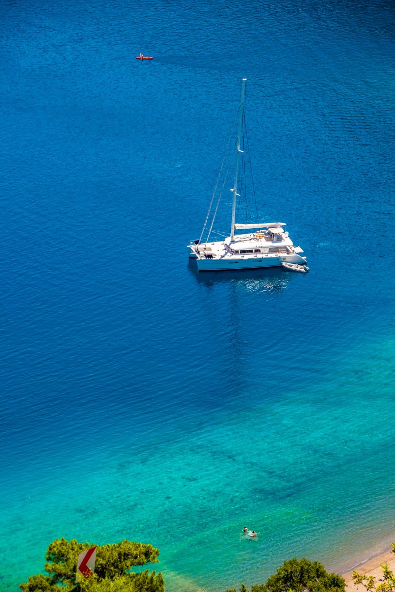 A catamaran at anchor in Sarsala Bay, near Göcek and Dalaman