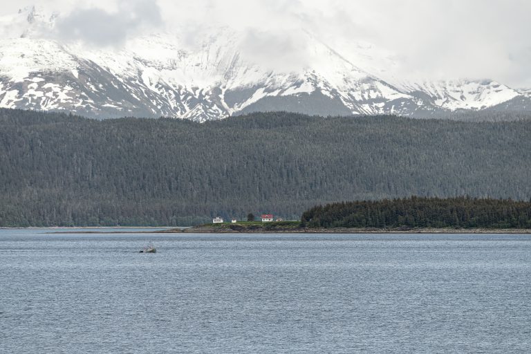 Lighthouse and homes on the northern point of Admiralty Island, Alaska