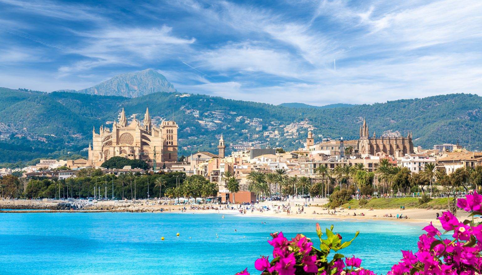 Palma de Mallorca's cathedral and old town above the city beach