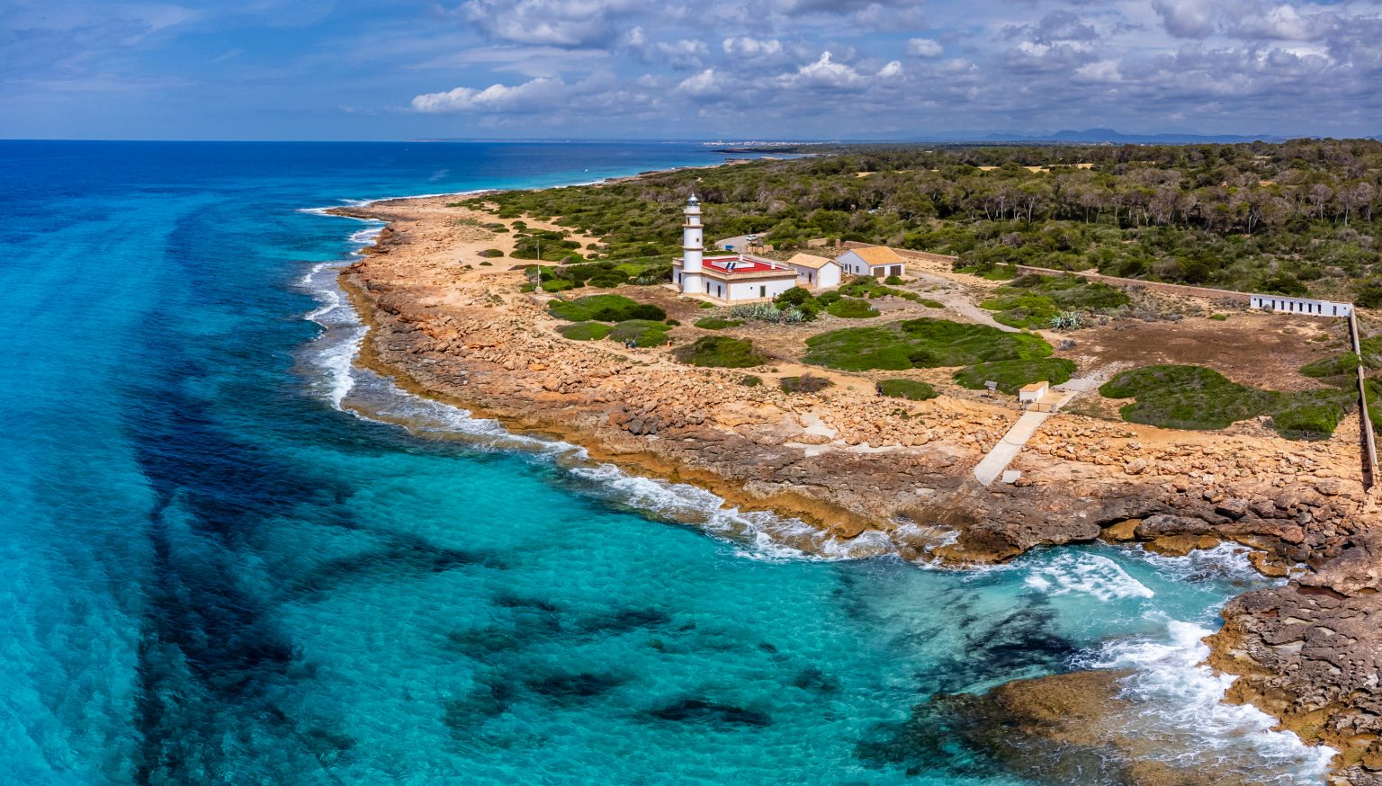 Cap de ses Salines lighthouse on Mallorca's south coast, facing Cabrera National Park